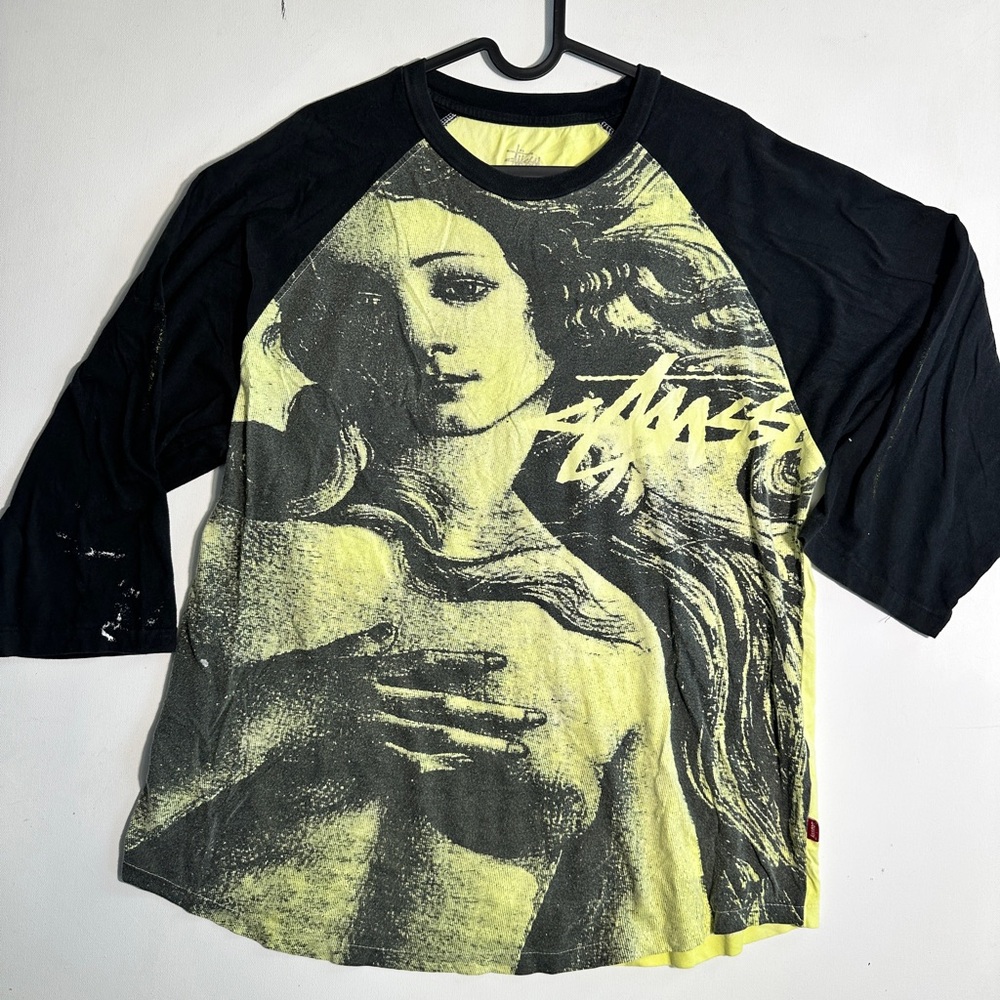 This is a Stüssy Venus graphic T Black and highlighter Yellow Graphic Raglan Tee